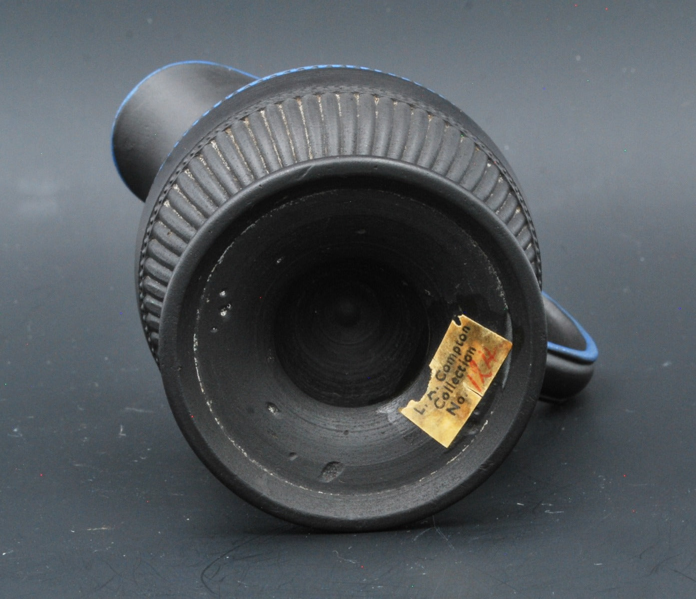 Silver shaped jug with painting