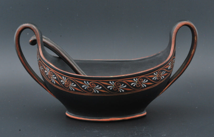Navette, encaustic decoration, with ladle