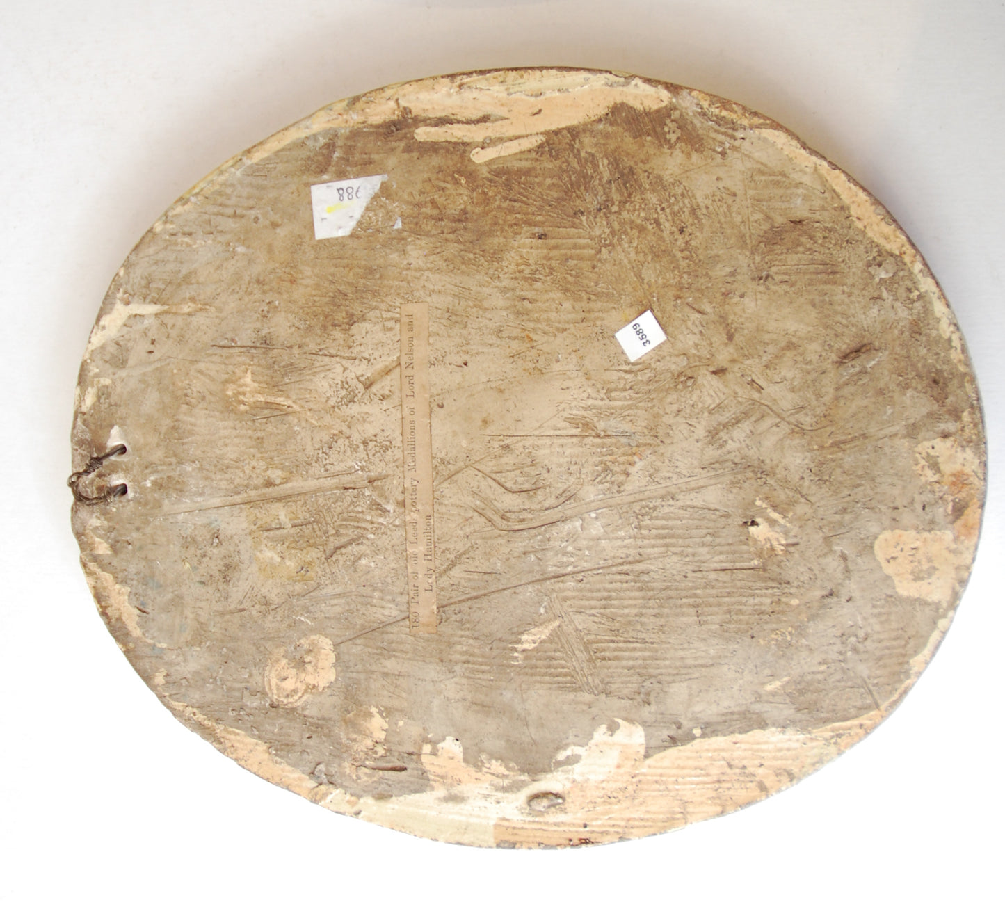 Pair creamware medallions: Nelson & Hamilton