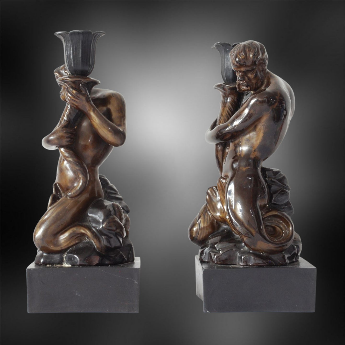 Pair Triton Candlesticks, bronzed