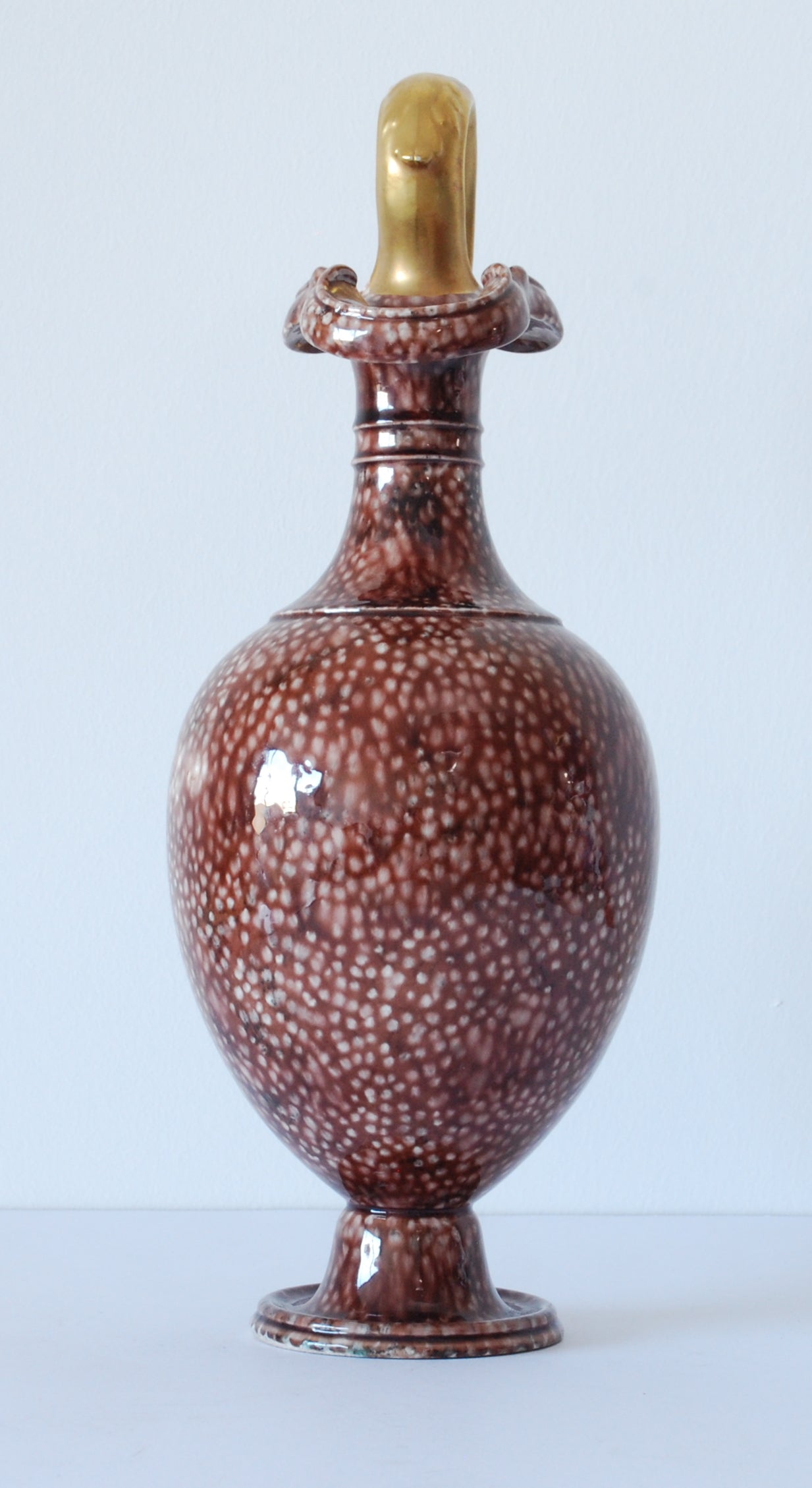 Oenochoe. Brown shagrene glaze.