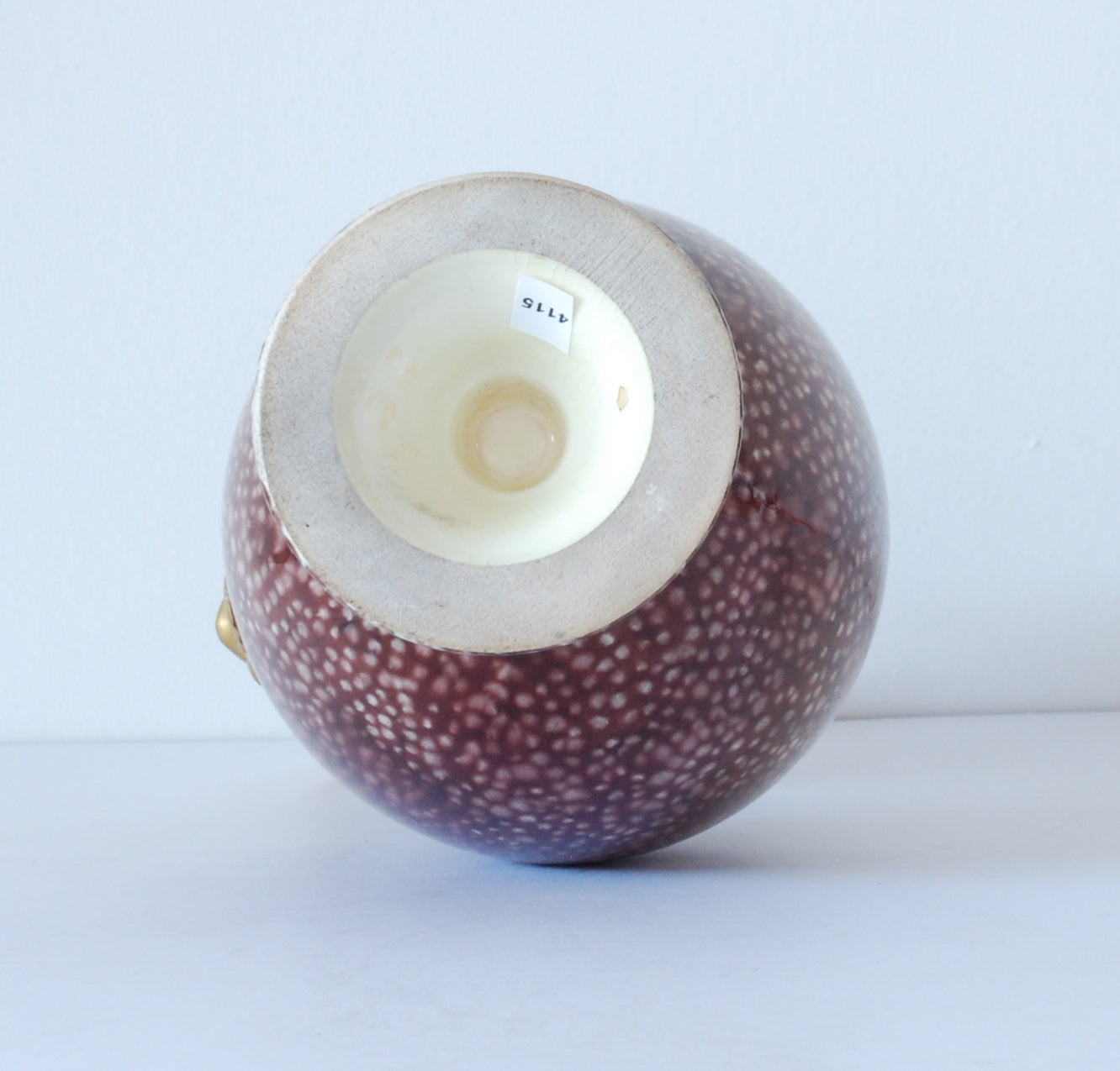 Oenochoe. Brown shagrene glaze.