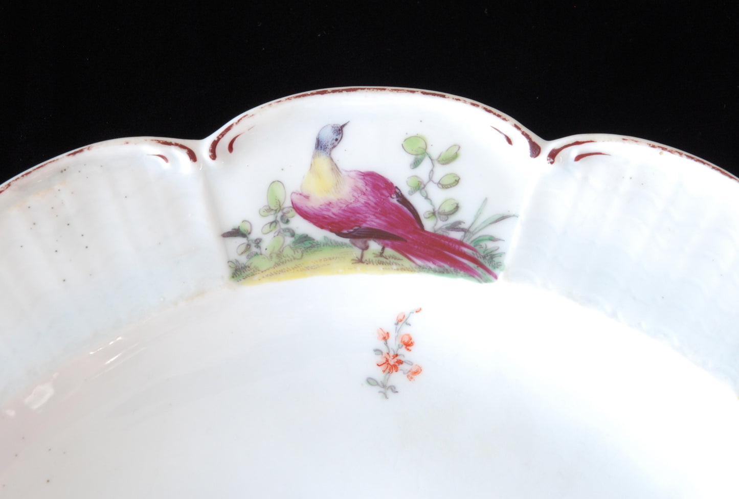 Pair plates, scalloped and flowers. Birds around the edge.