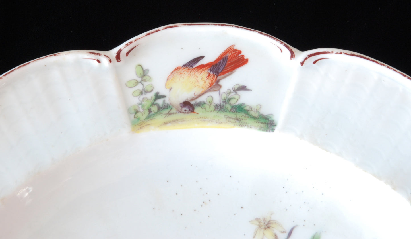 Pair plates, scalloped and flowers. Birds around the edge.