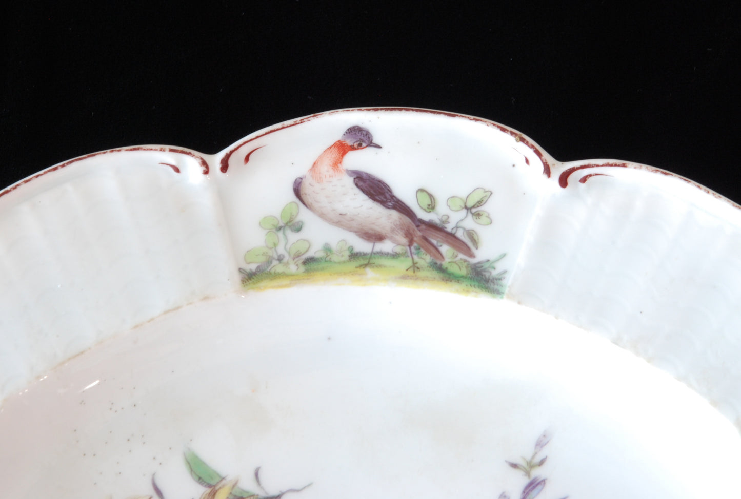 Pair plates, scalloped and flowers. Birds around the edge.
