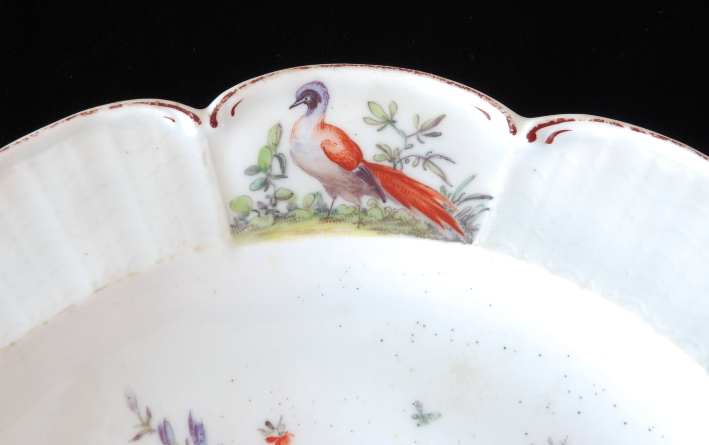 Pair plates, scalloped and flowers. Birds around the edge.