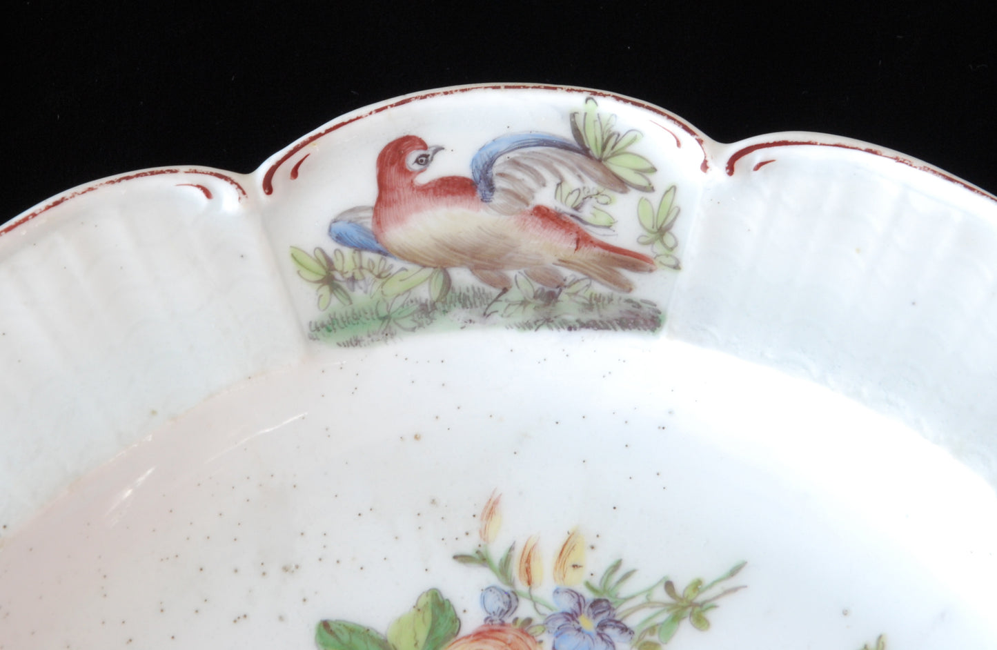 Pair plates, scalloped and flowers. Birds around the edge.
