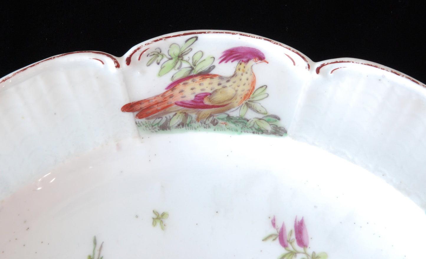 Pair plates, scalloped and flowers. Birds around the edge.