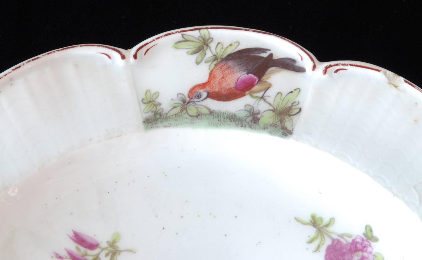 Pair plates, scalloped and flowers. Birds around the edge.