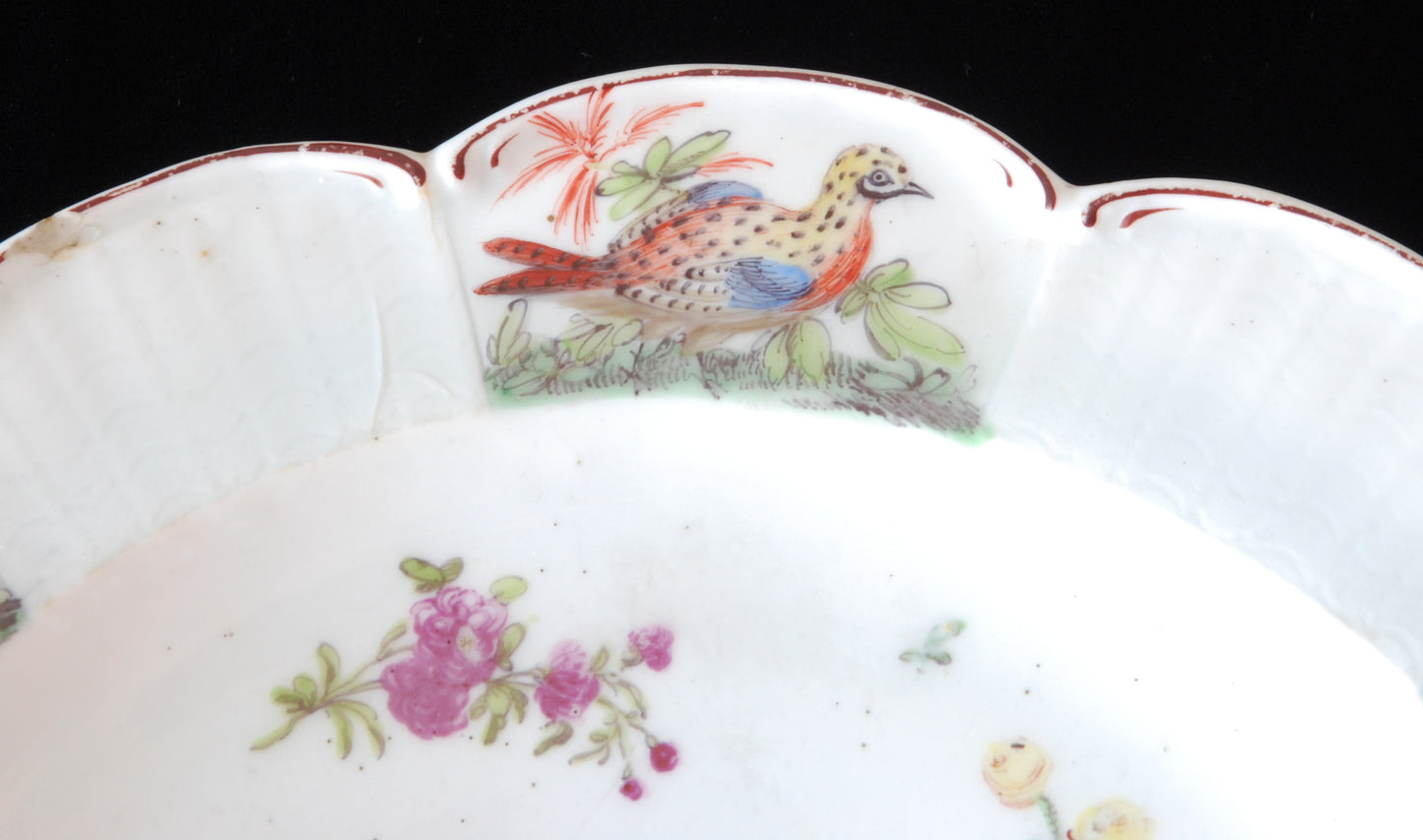 Pair plates, scalloped and flowers. Birds around the edge.