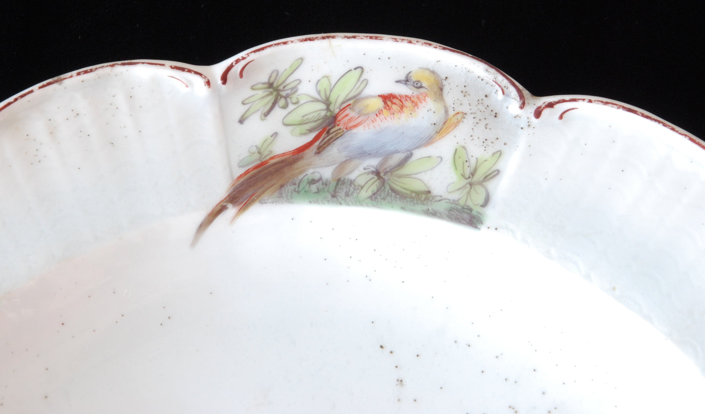 Pair plates, scalloped and flowers. Birds around the edge.