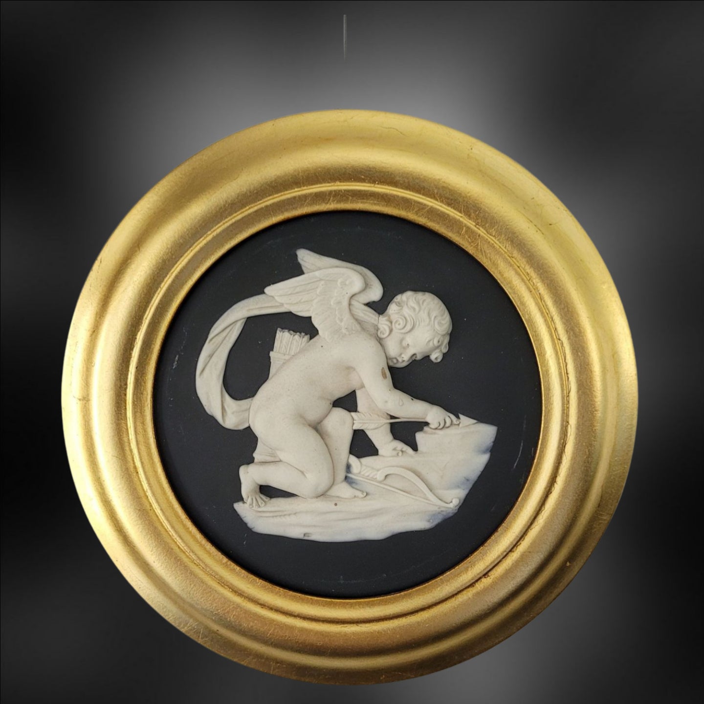 Pair roundels: Cupid