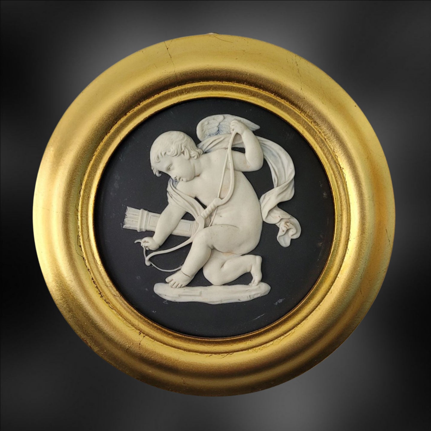 Pair roundels: Cupid