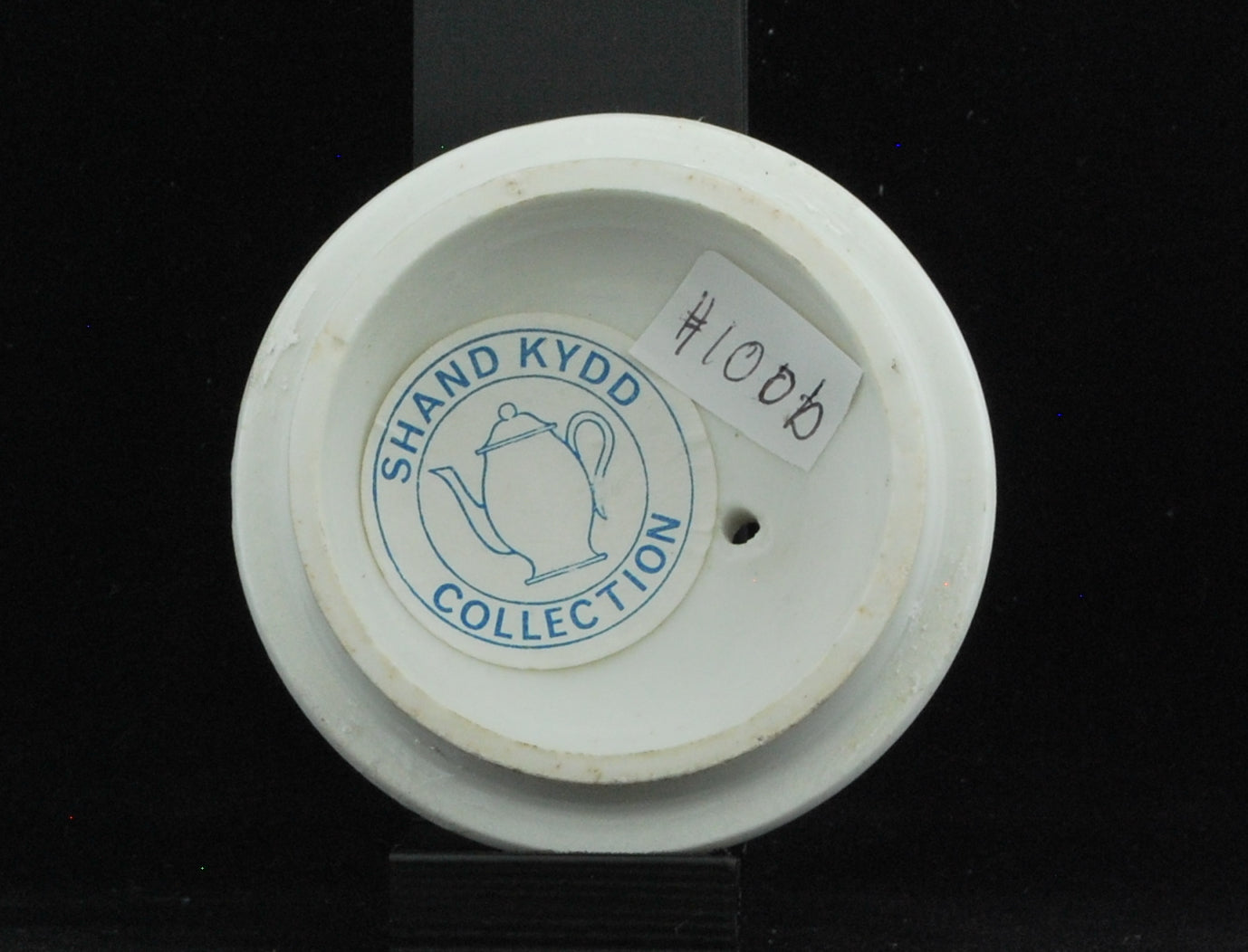 Teapot, drum shape, Prunus decoration