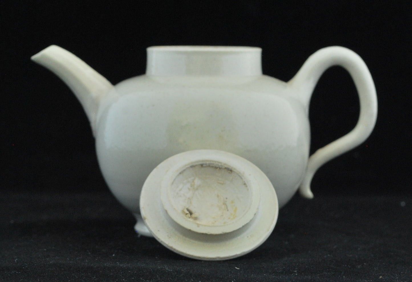 Small white teapot