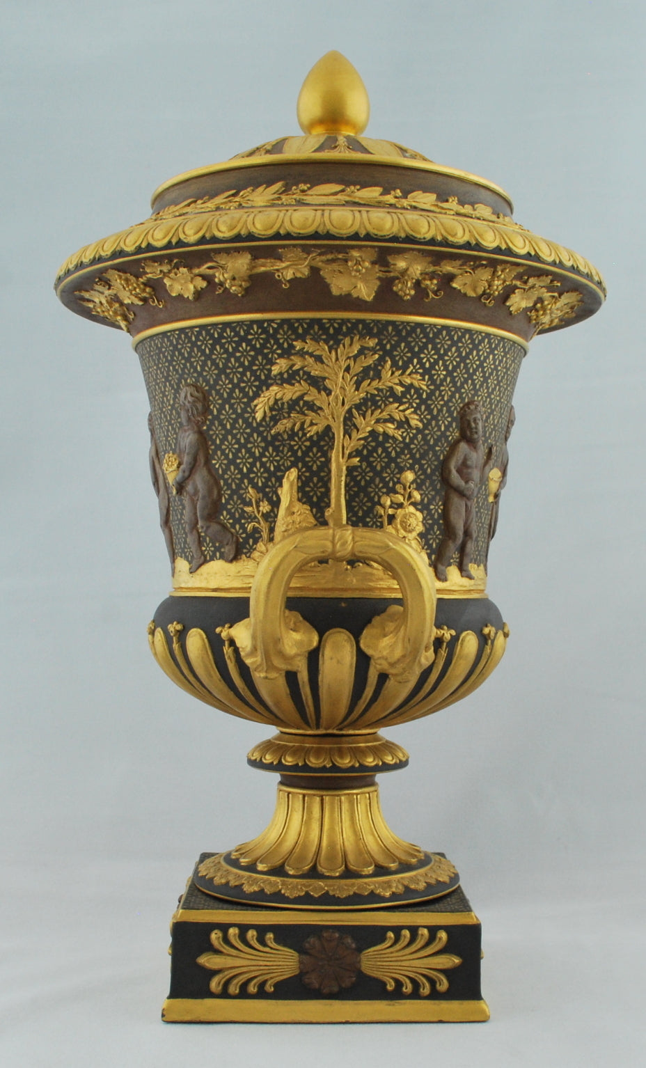 Campana vase, bronzed and gilt, Cavorting Boys
