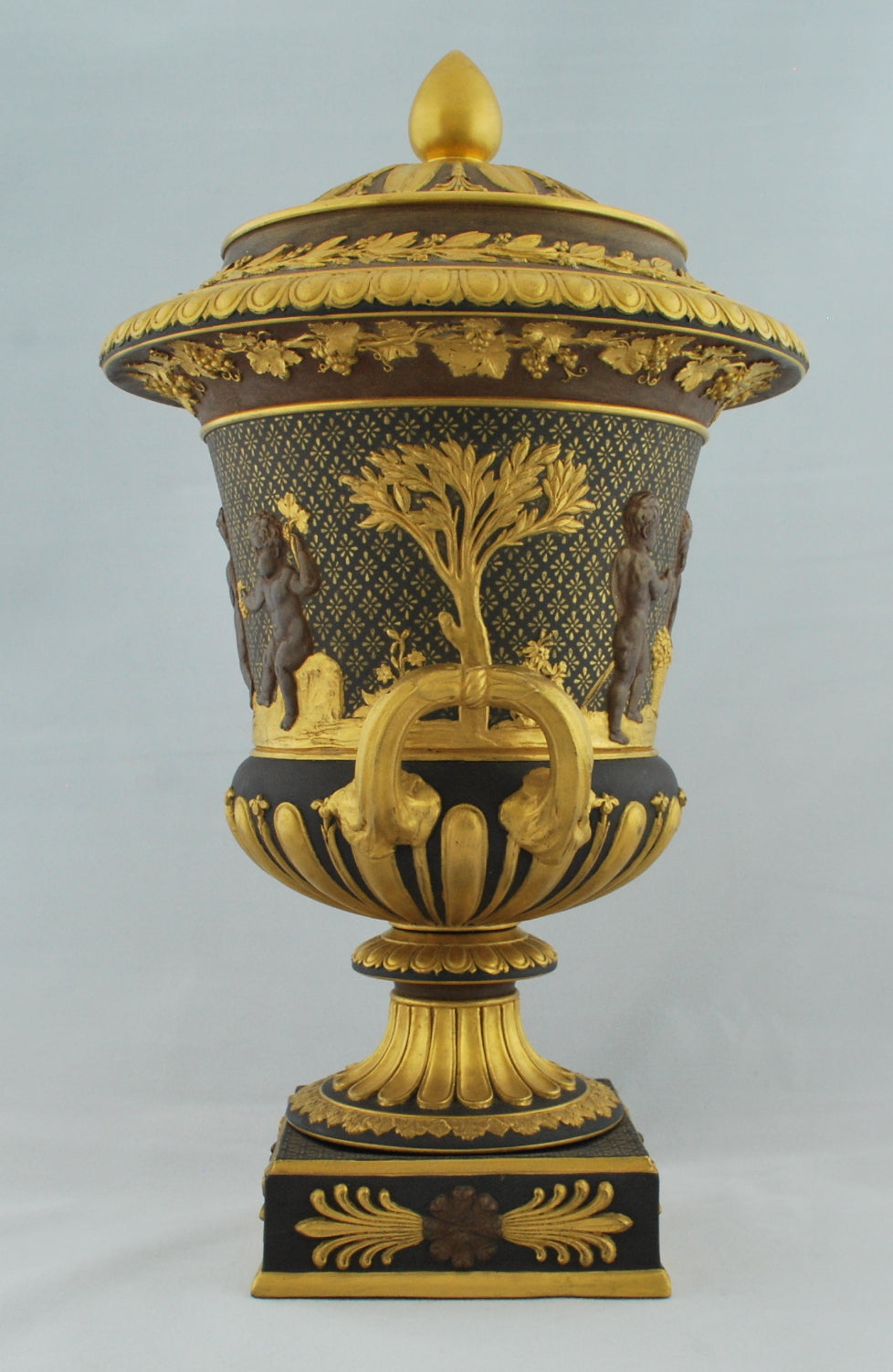 Campana vase, bronzed and gilt, Cavorting Boys