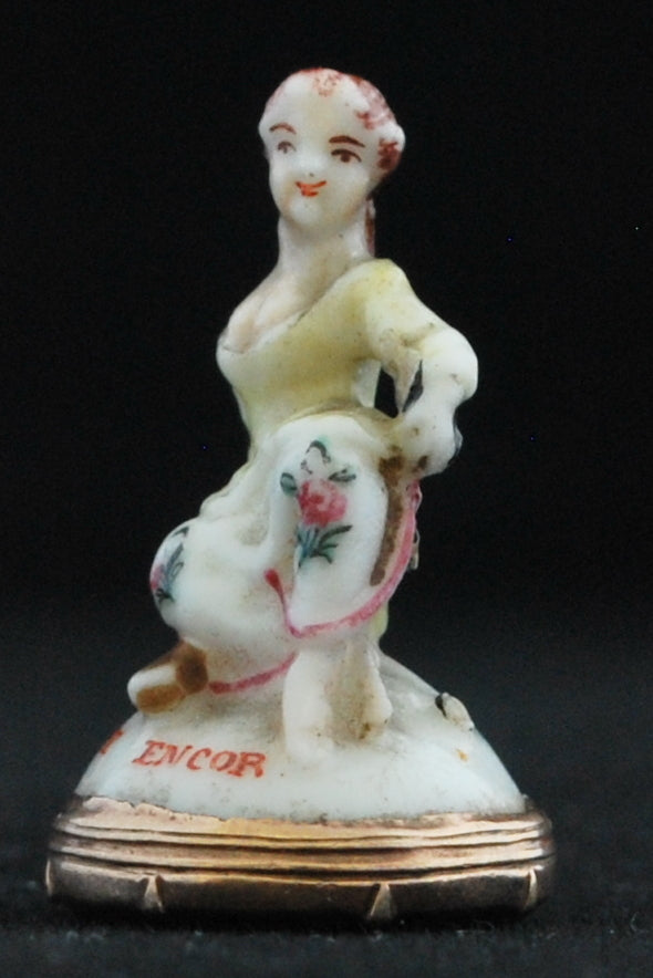 Seal. Seated girl, J'Espere Encore