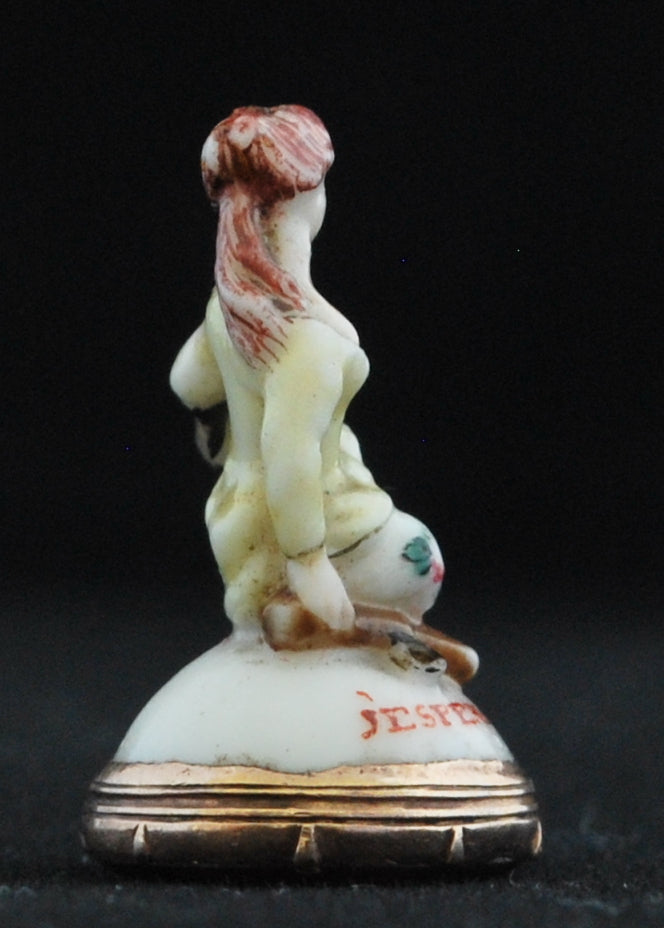 Seal. Seated girl, J'Espere Encore