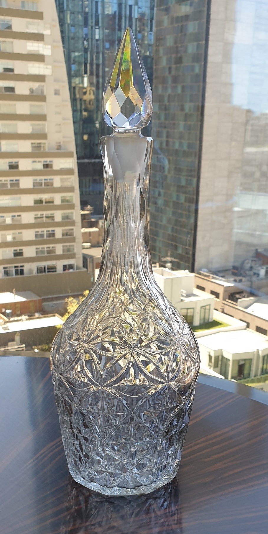 Indian Club shaped decanter, circles cut design