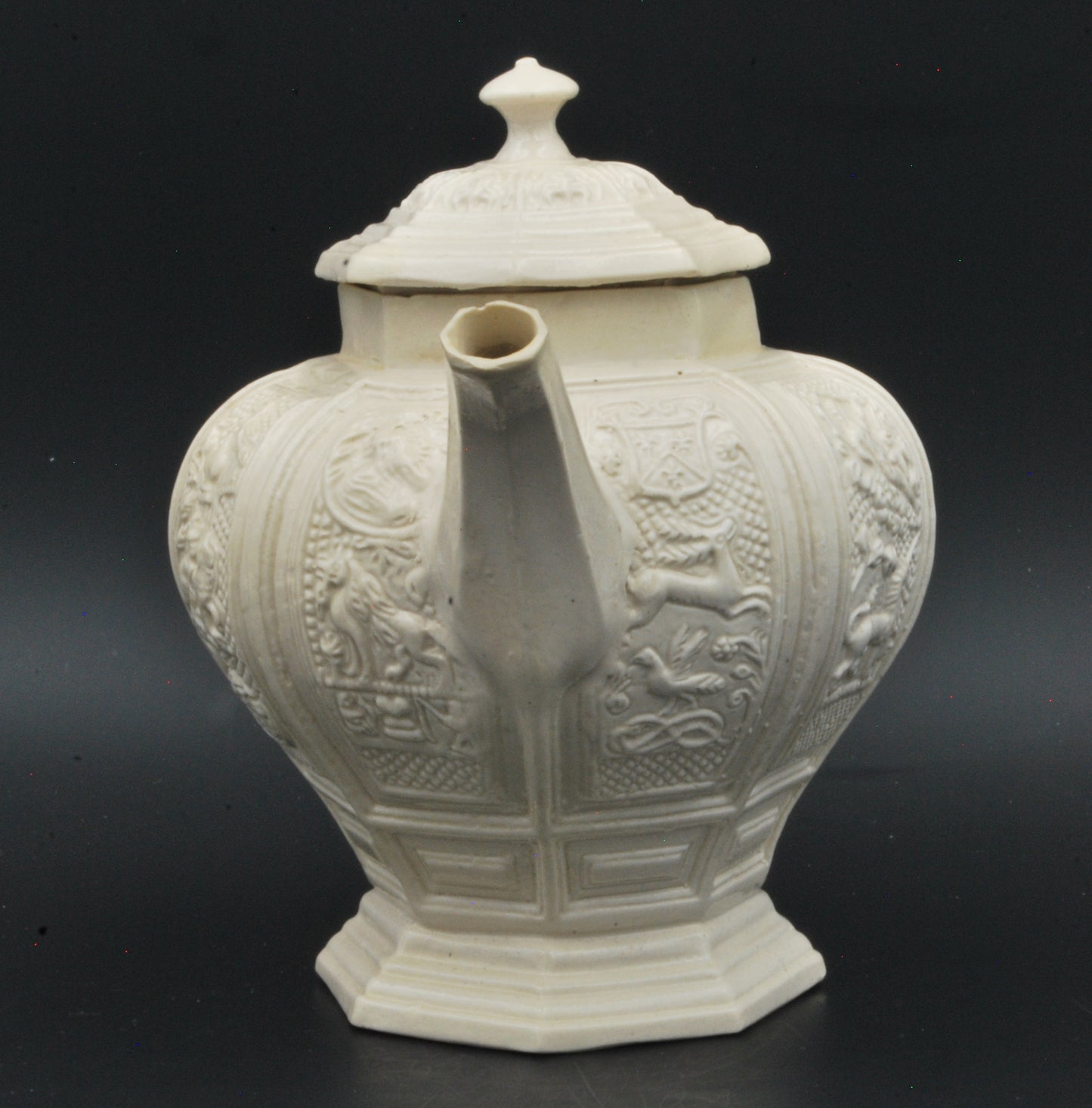 Baluster form saltglaze teapot. Beasts.