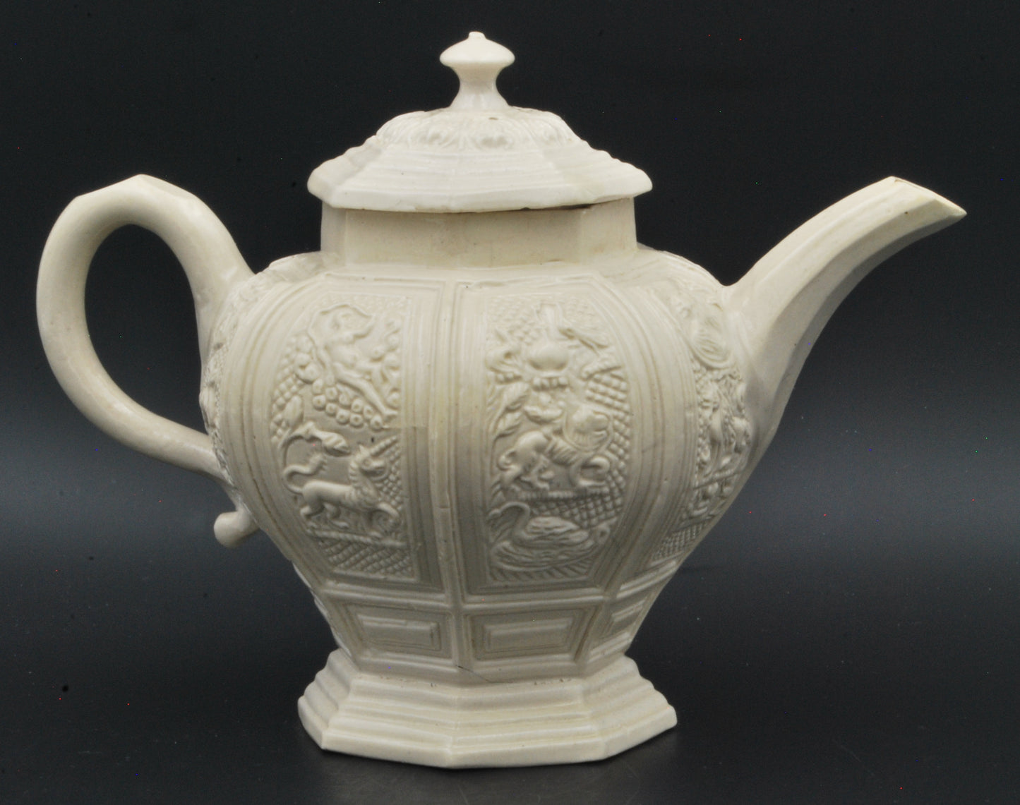 Baluster form saltglaze teapot. Beasts.