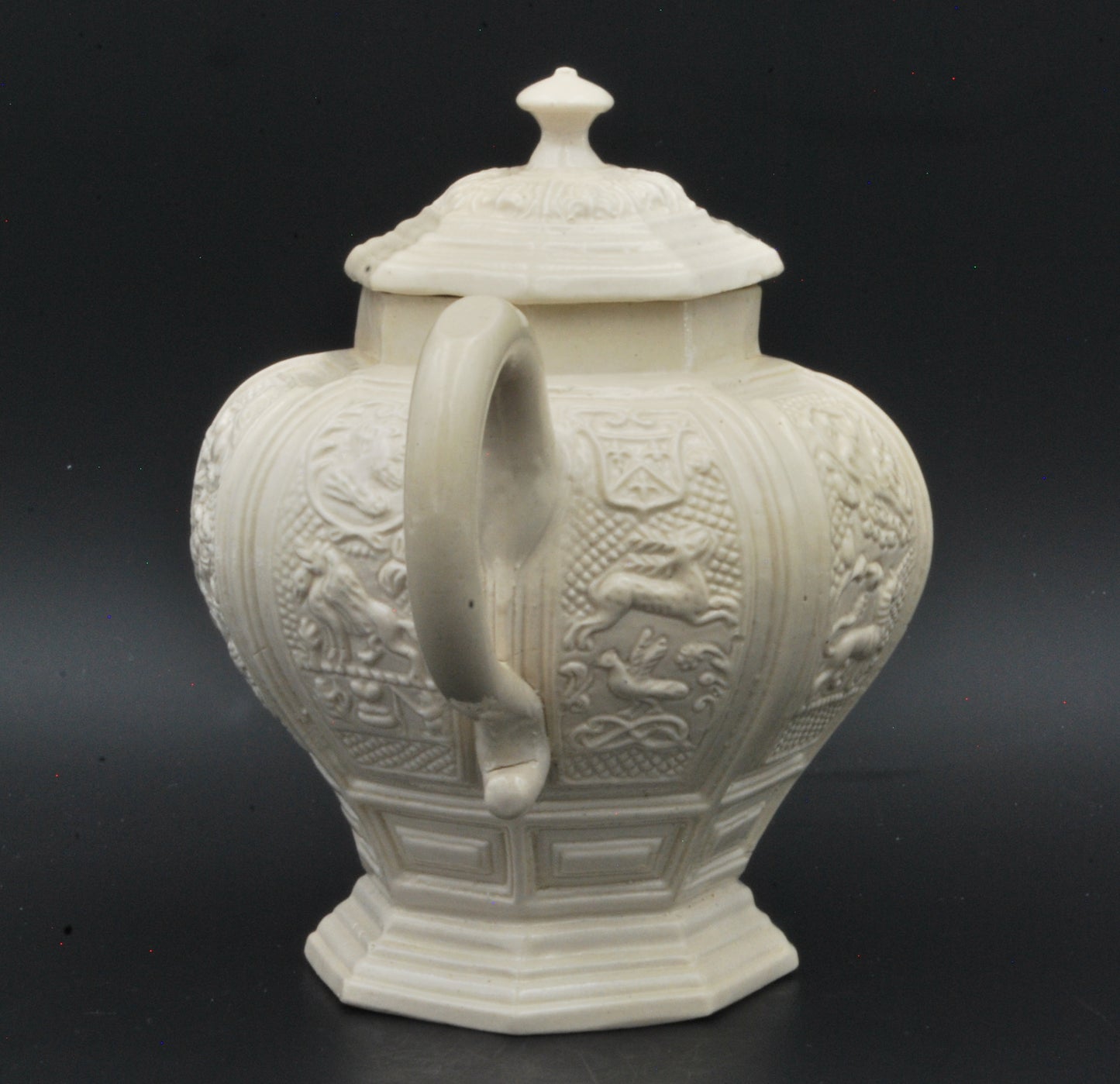 Baluster form saltglaze teapot. Beasts.