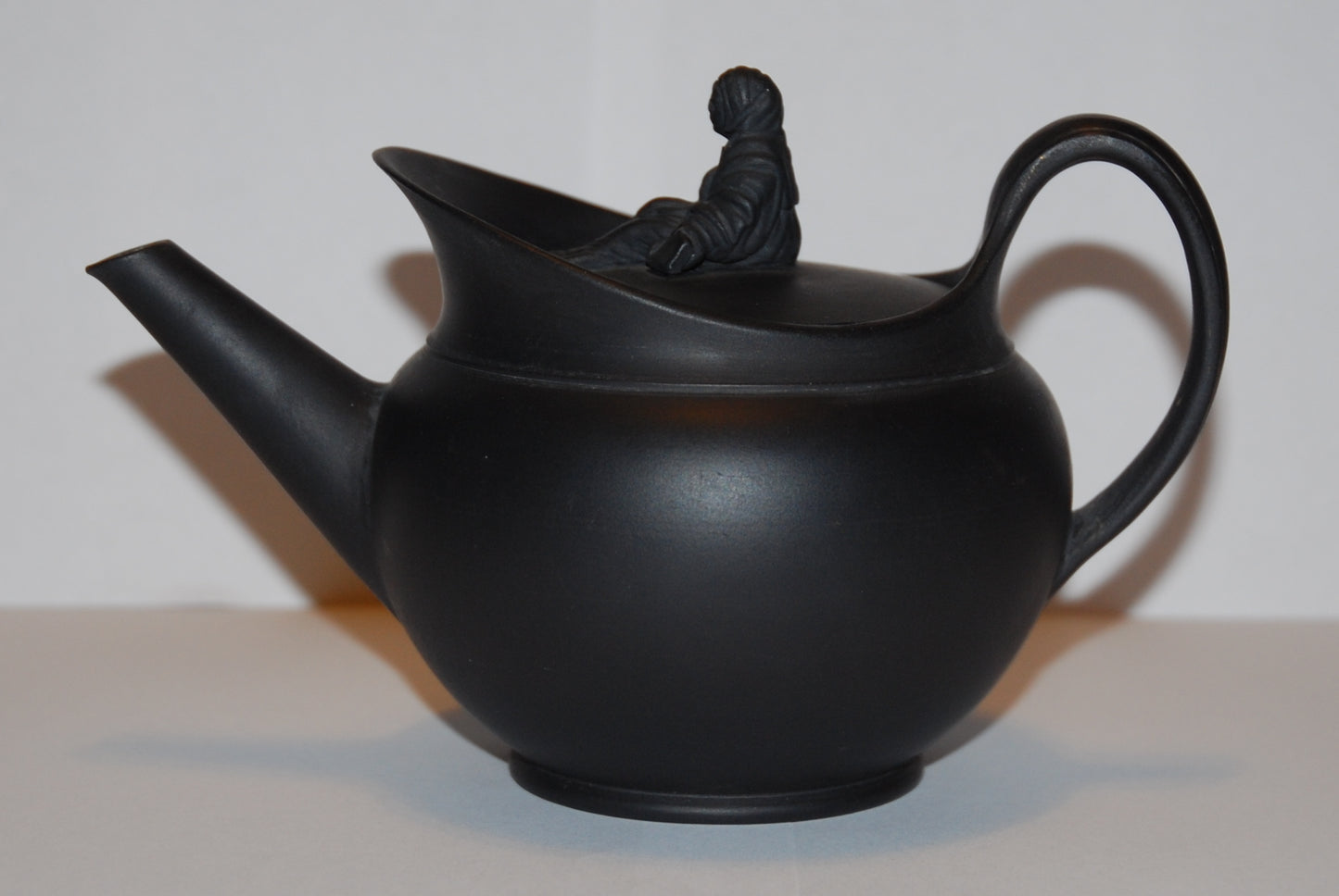 Teapot; round, caped; Sybil finial