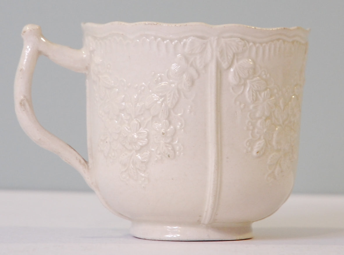 Creamware cup; Garlands; twig handle