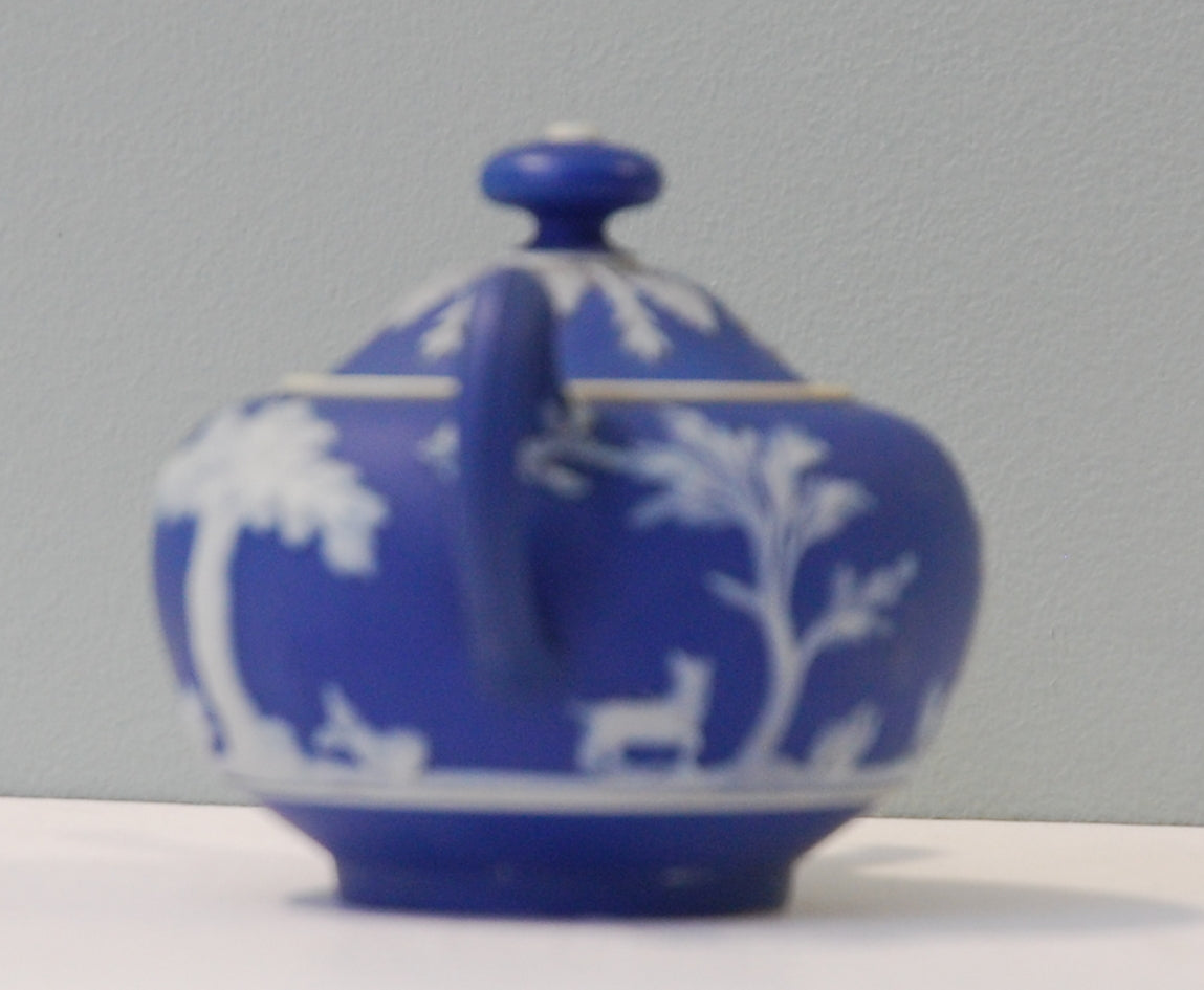 Miniature teawares: Teapot. Bourbonnaise shepherd.