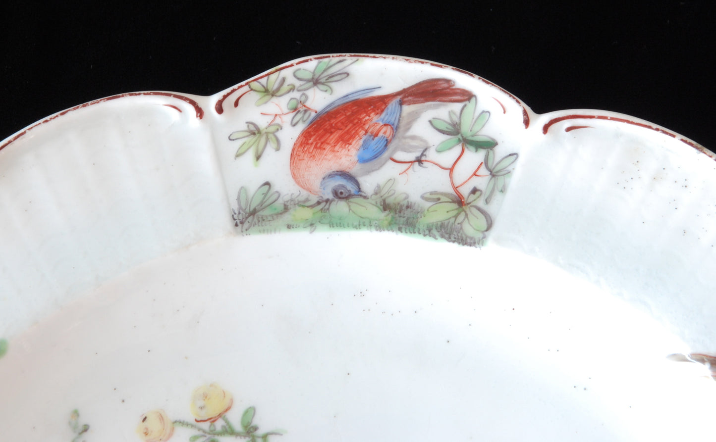 Pair plates, scalloped and flowers. Birds around the edge.