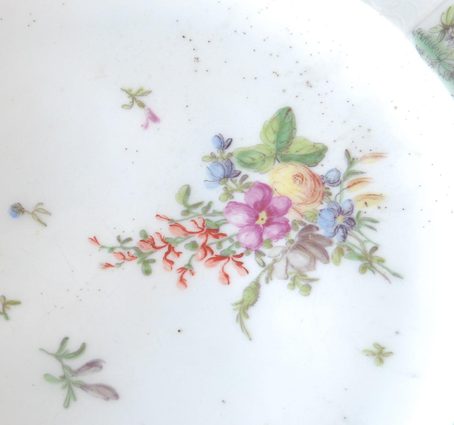 Pair plates, scalloped and flowers. Birds around the edge.