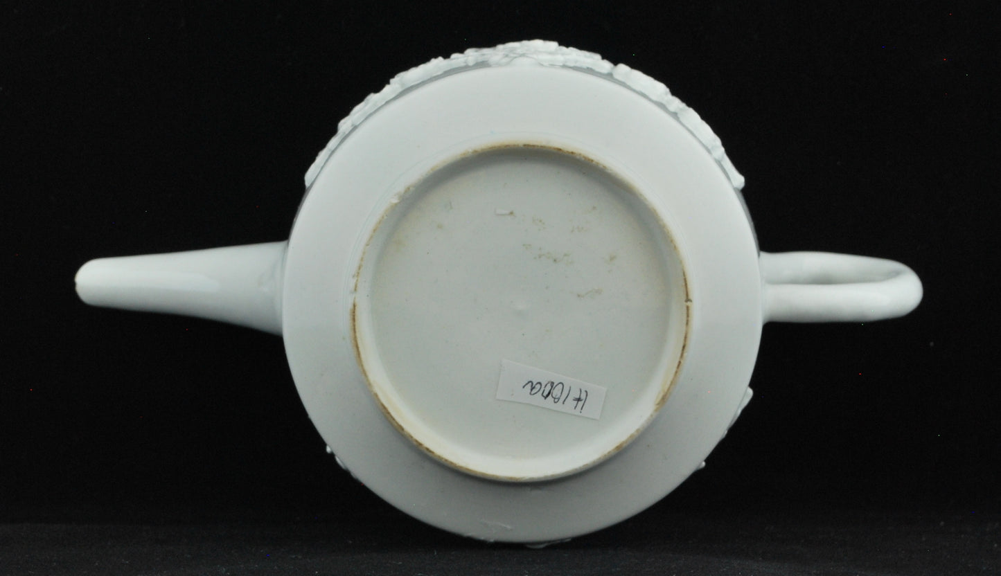 Teapot, drum shape, Prunus decoration