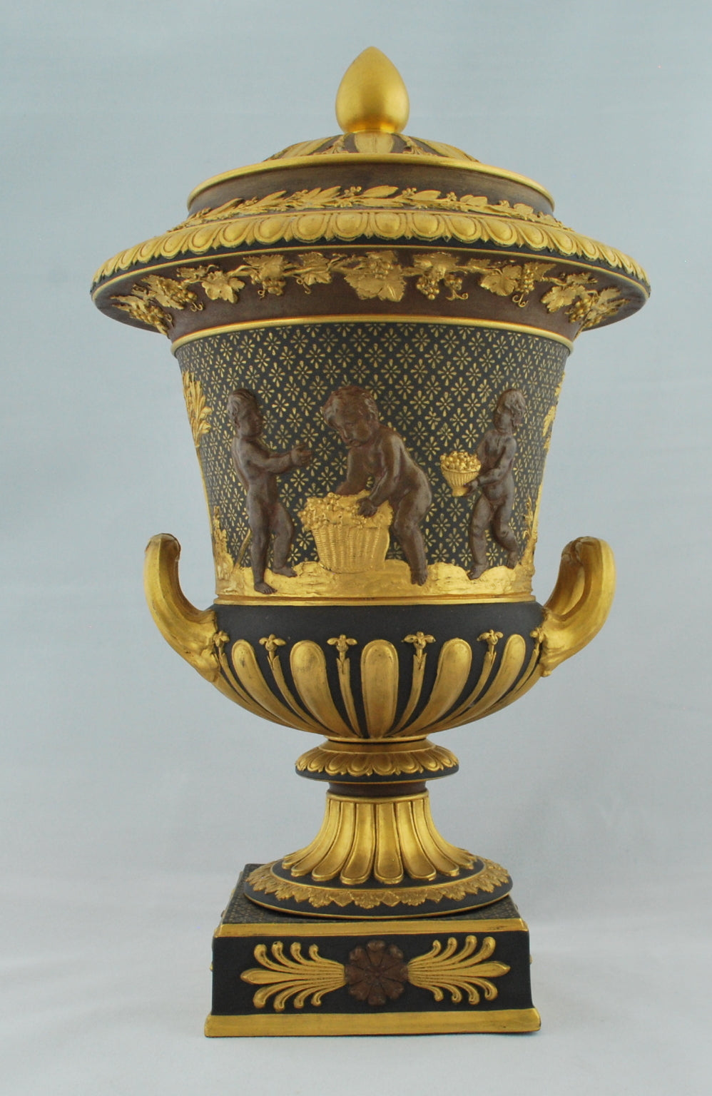 Campana vase, bronzed and gilt, Cavorting Boys