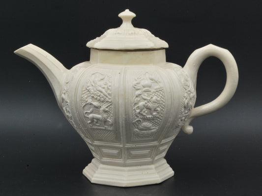 Baluster form saltglaze teapot. Beasts.