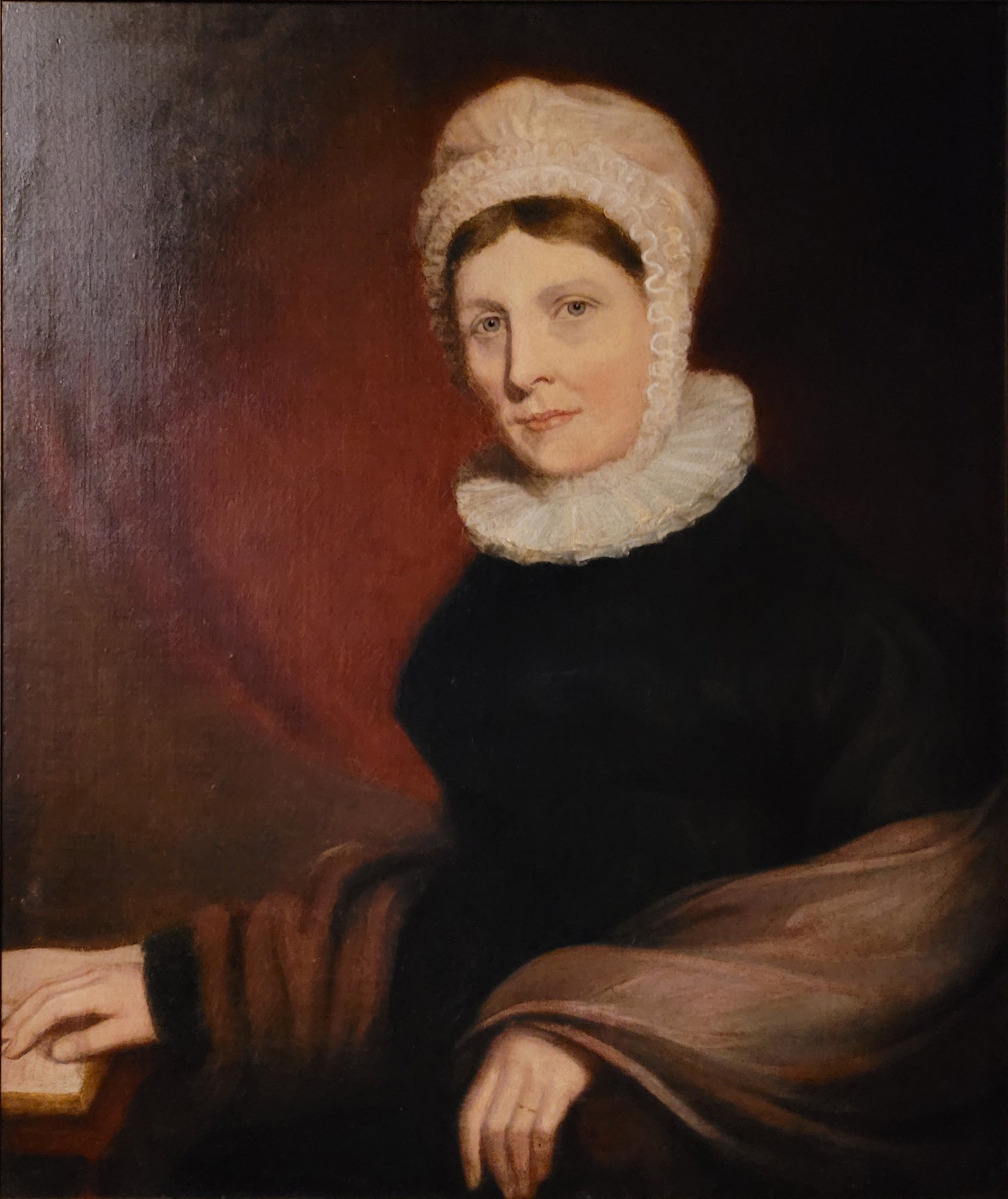 Portrait of a woman in ruffle and frilled cap